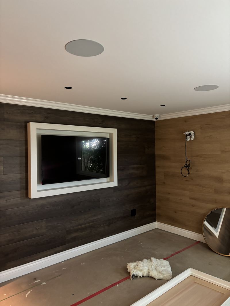 Custom media room with accent wall